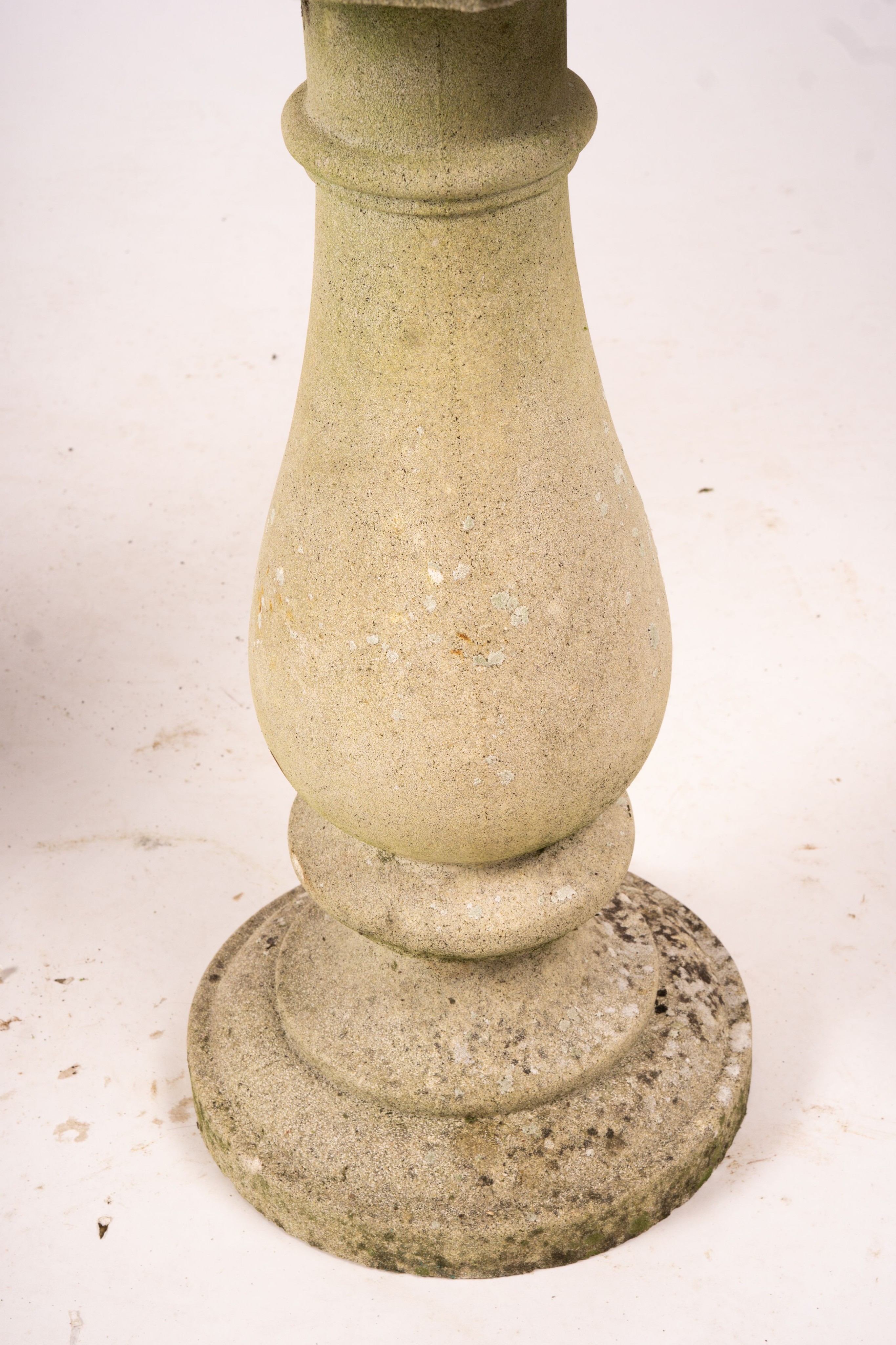 A reconstituted stone baluster pillar sundial and bird bath, tallest 72cm